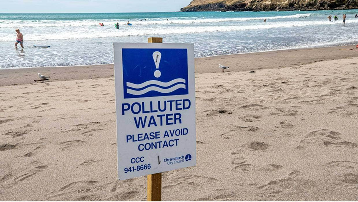 In Canterbury, the Lyttelton Harbour Company conducts dredge dumping for maintenance near the shore. This could alter both water quality and bathymetry, which in turn would alter the surf breaks located there. Following an appeal by the Surfbreak Protection Society, the resource authorization for the dumping of maintenance dredges included a condition that the local community participate by sharing information on wave quality, monitoring and determining, if necessary, the need for management measures. In the image, Taylors Mistake beach appears closed after being declared unsafe due to a sewage spill. Photo: Stacy Squires.